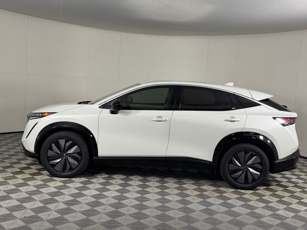 Used 2024 White Nissan EVOLVE+ image 8
