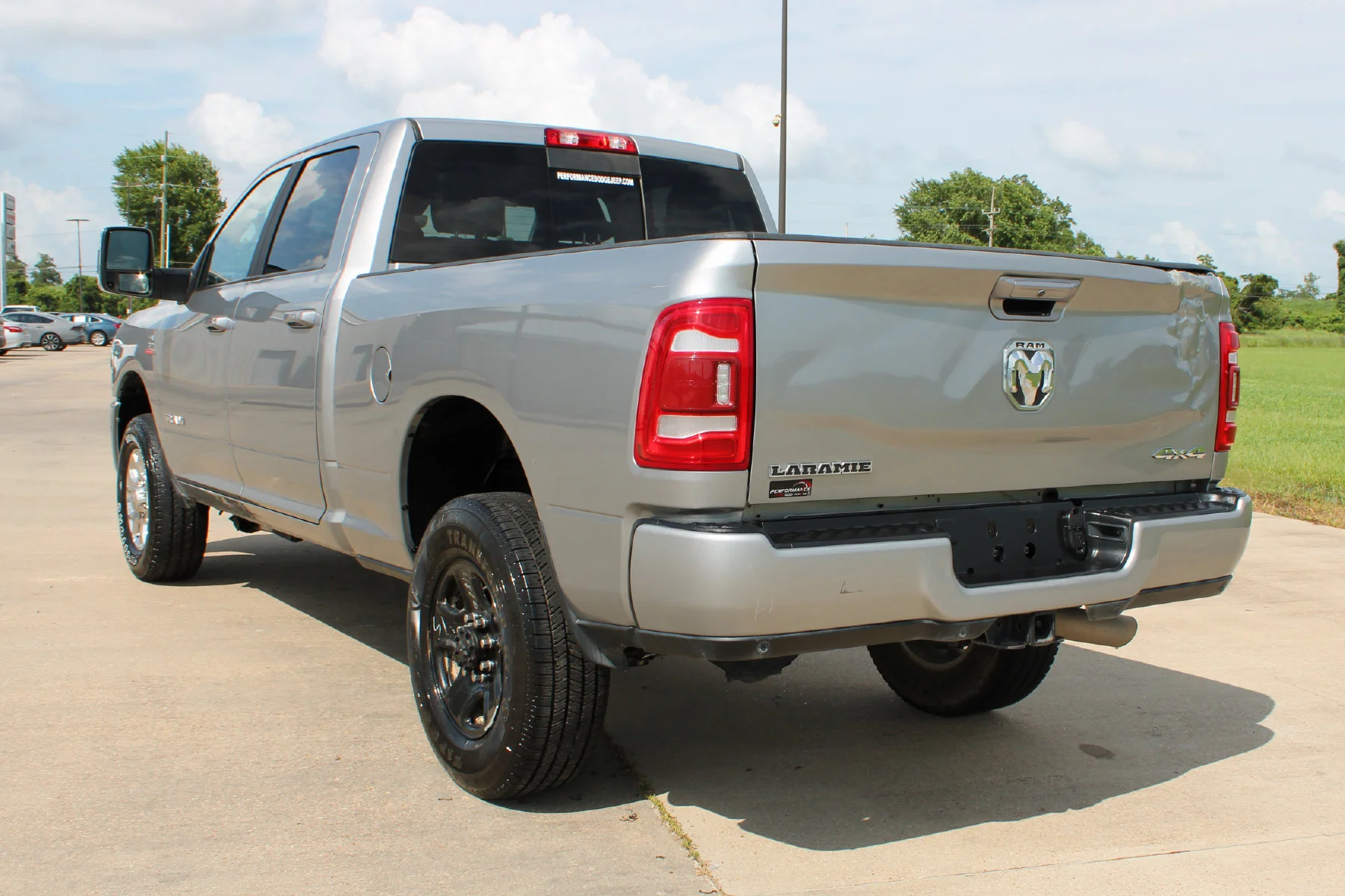 Used 2024 Billet Silver Metallic Clearcoat Ram Laramie 4x4 Crew Cab 6