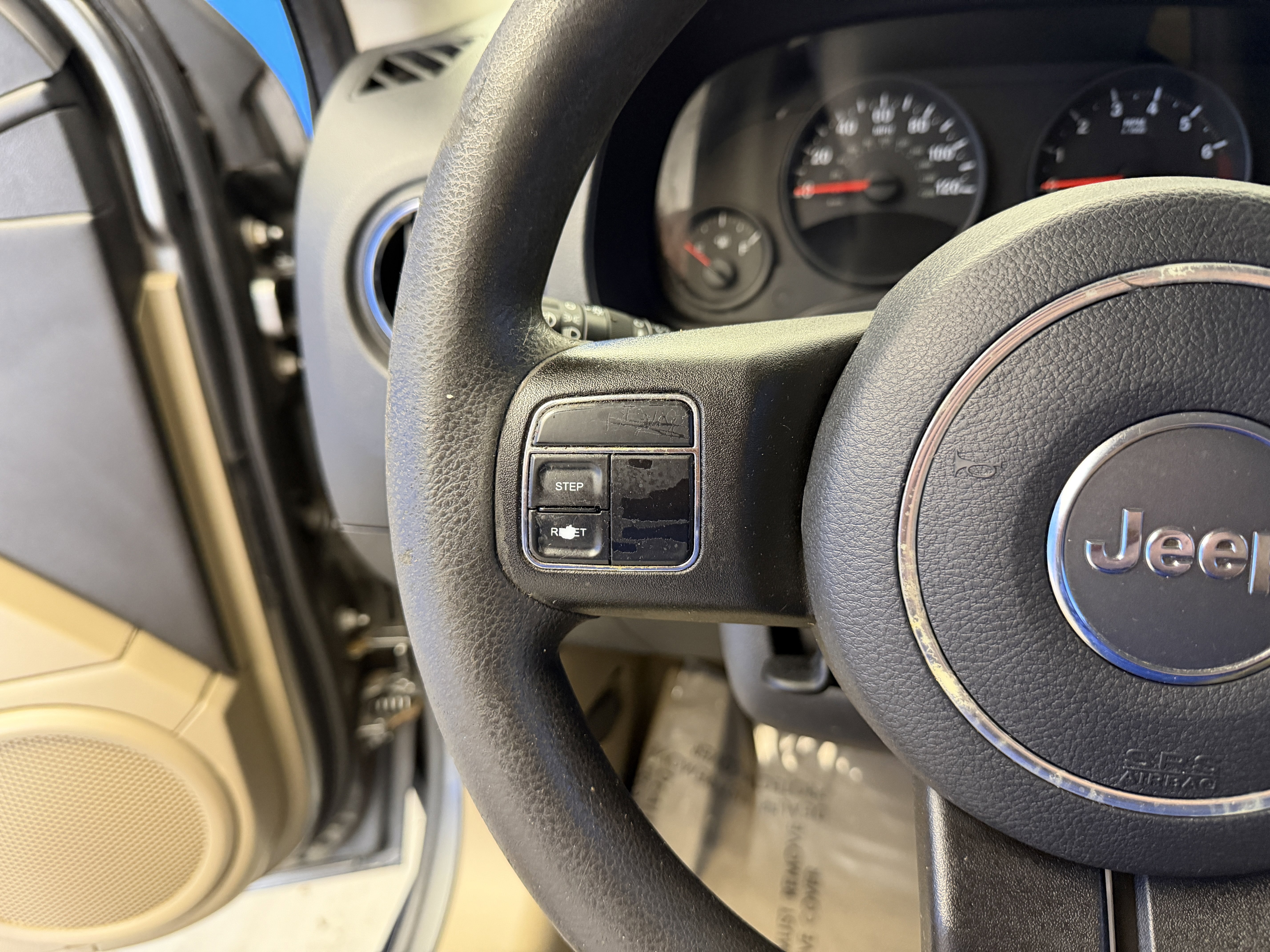 Used 2012 Mineral Gray Metallic Jeep Sport image 13