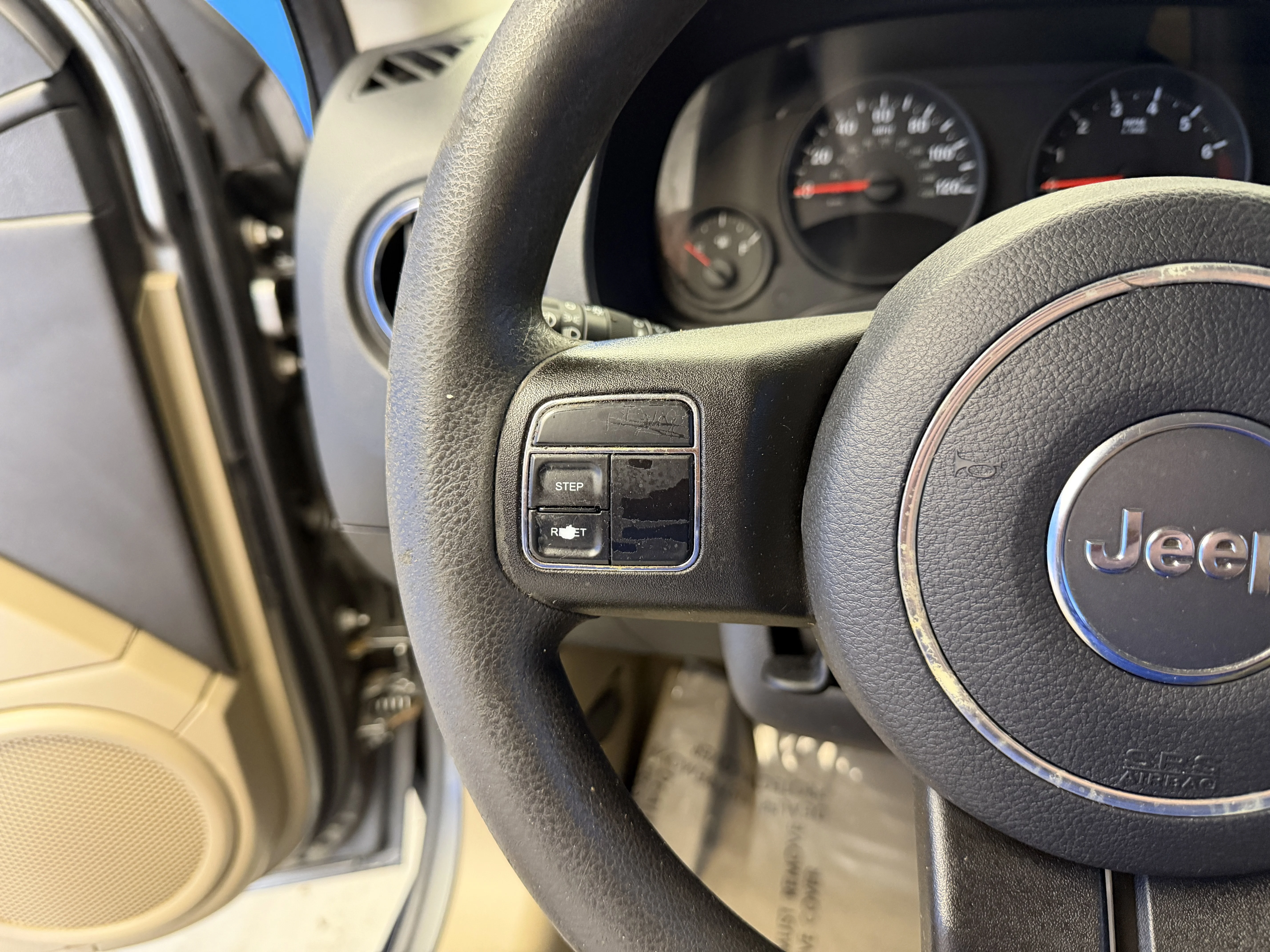 Used 2012 Mineral Gray Metallic Jeep Sport image 13