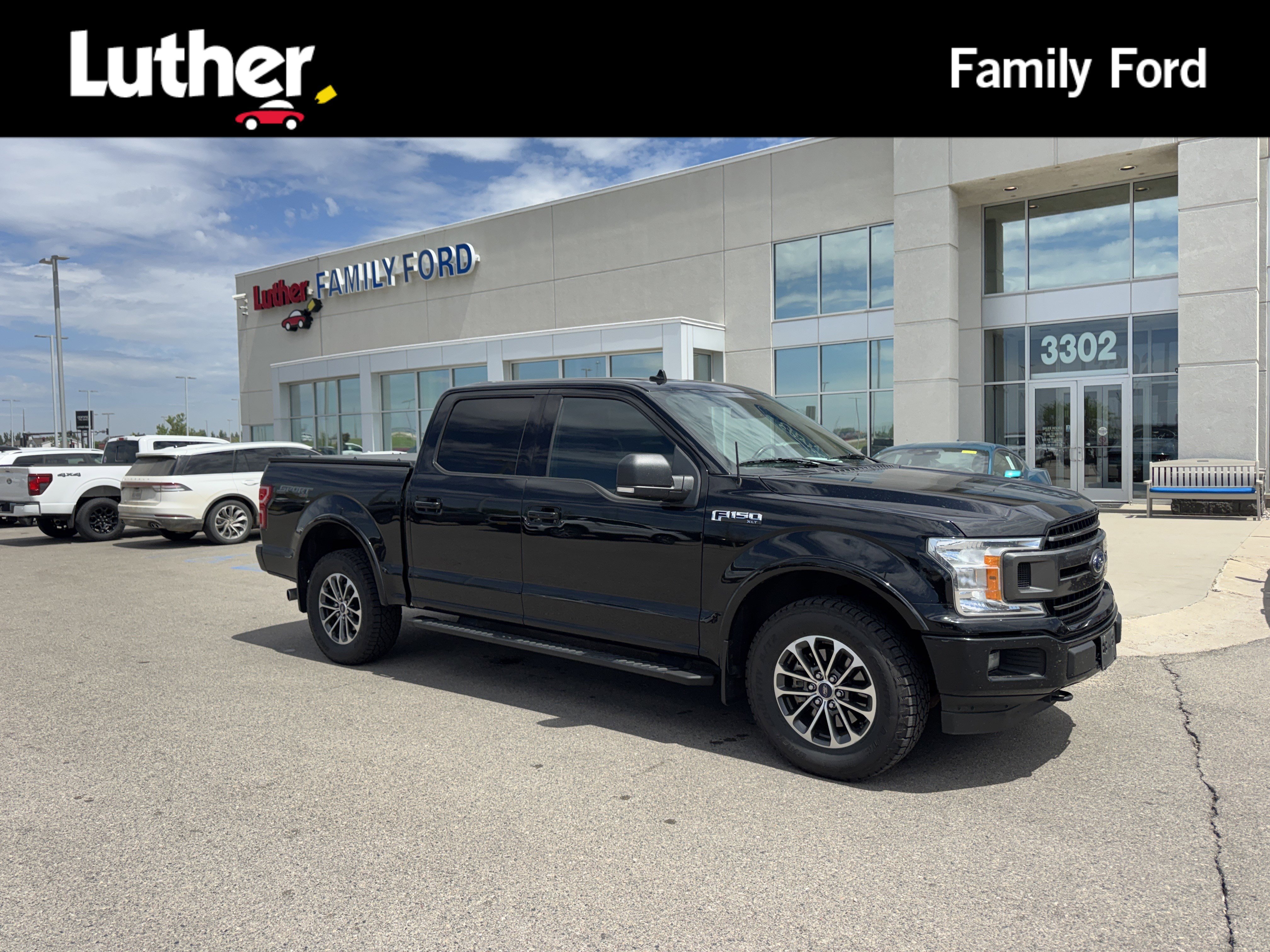 Used 2018 Shadow Black Ford XLT image 1
