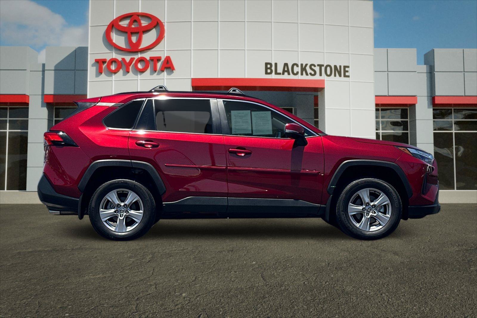 Certified Used 2025 Ruby Flare Pearl Toyota XLE image 2