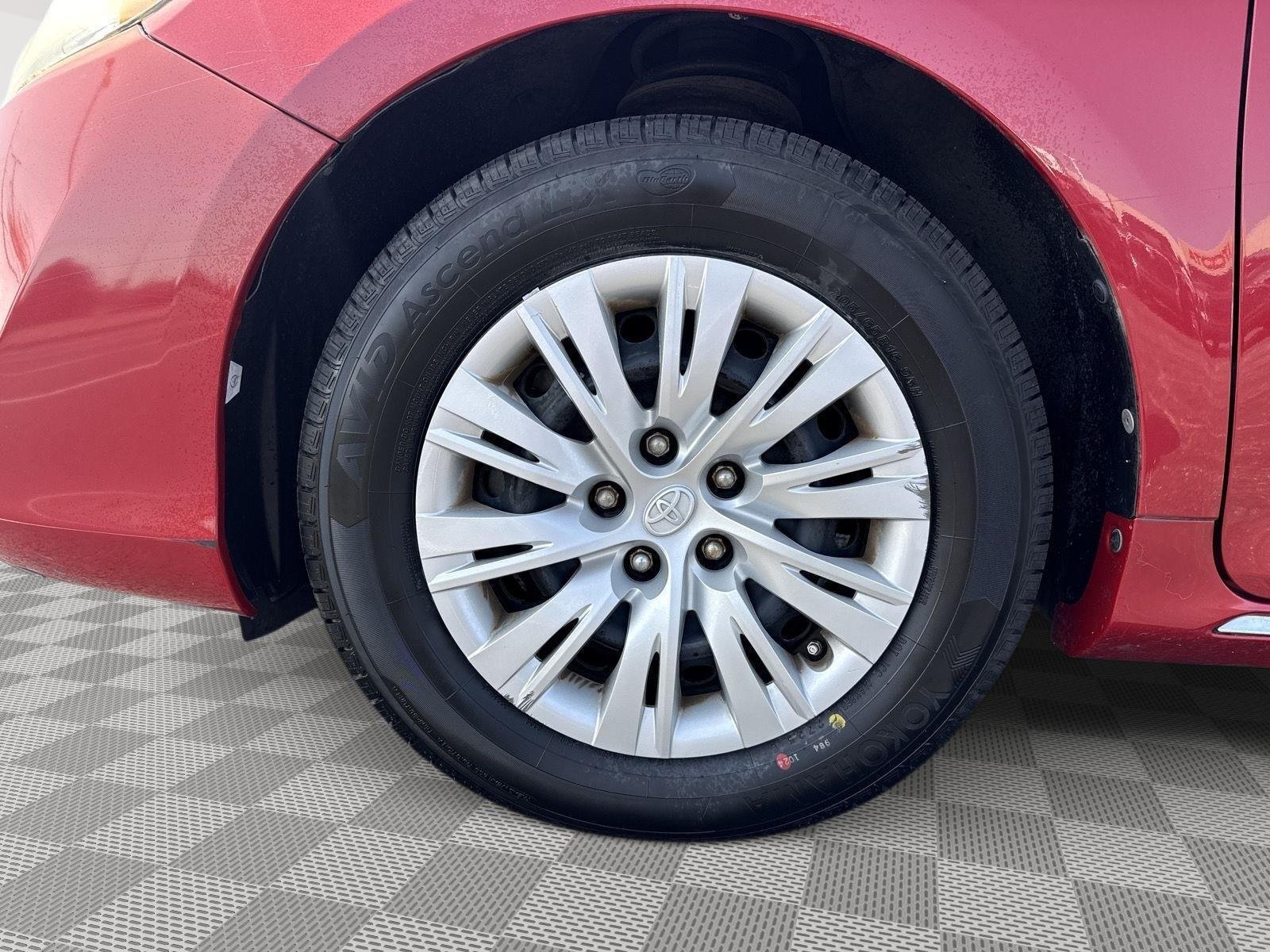 Used 2013 Barcelona Red Metallic Toyota LE image 9