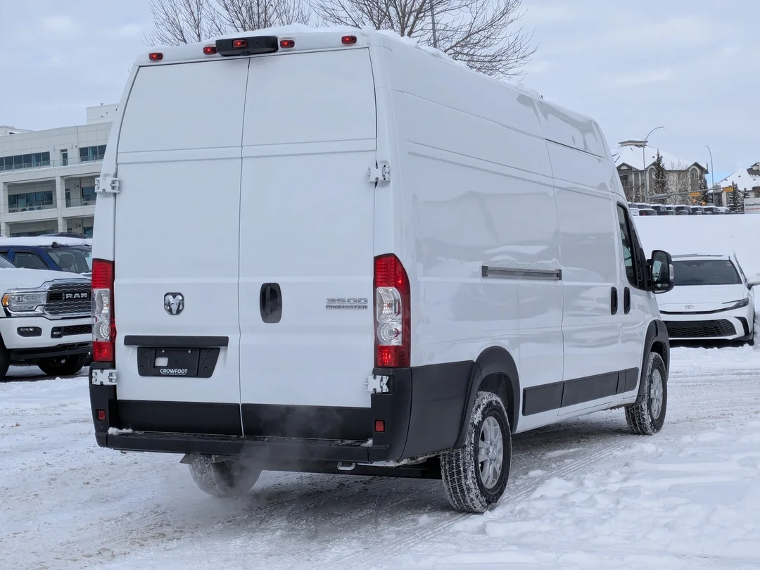 New 2026 White RAM SLT - - FWD - Super High Roof - Package 22G - LED Headlamps - Cargo Partition & More! image 7