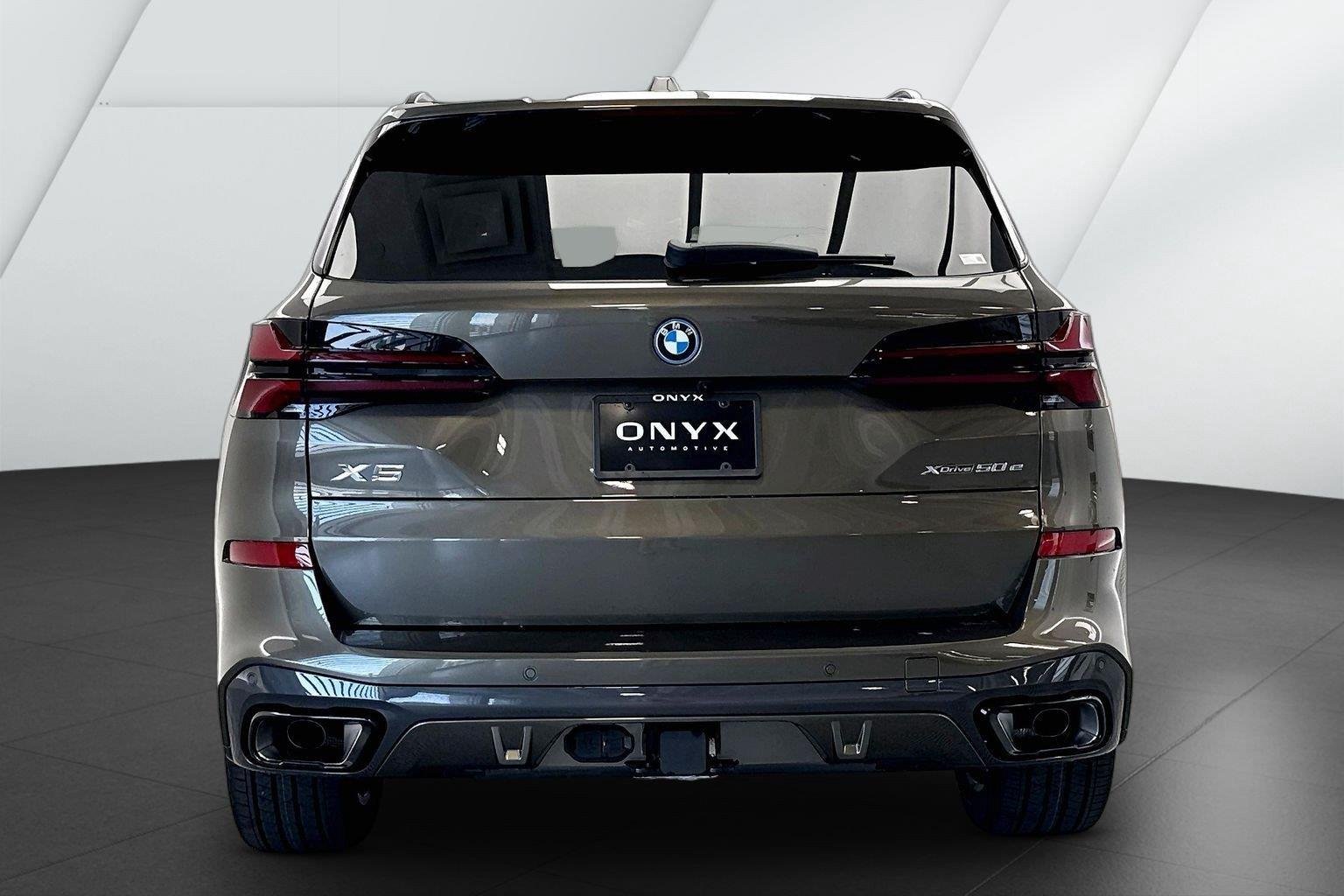 New 2026 Manhattan Green Metallic BMW xDrive50e image 7