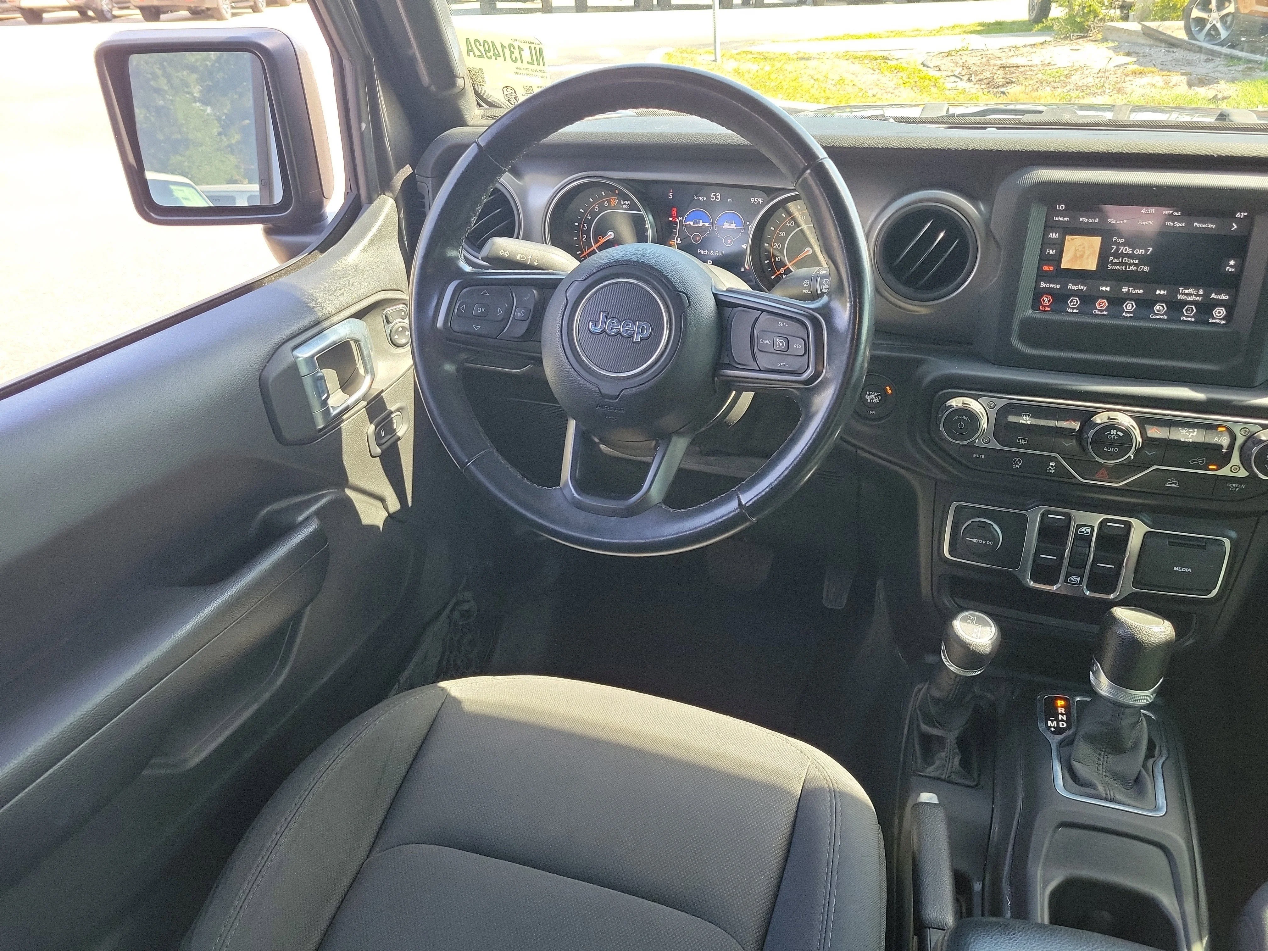 Used 2022 Granite Crystal Metallic Clearcoat Jeep Sport S image 17
