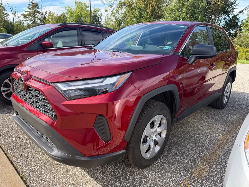 Certified Used 2025 Red Toyota LE image 1