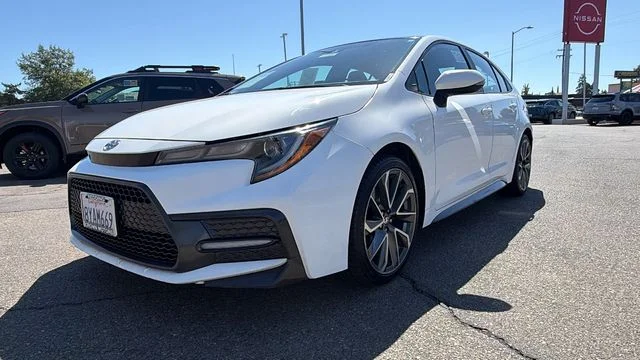 Used 2022 Black Sand Pearl Toyota SE image 9