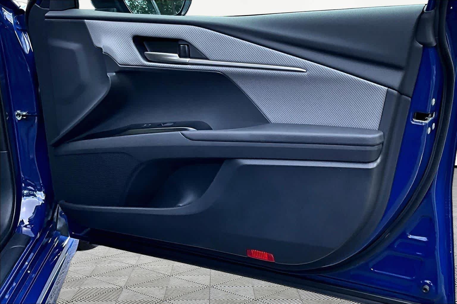 Used 2025 Reservoir Blue Toyota SE image 23