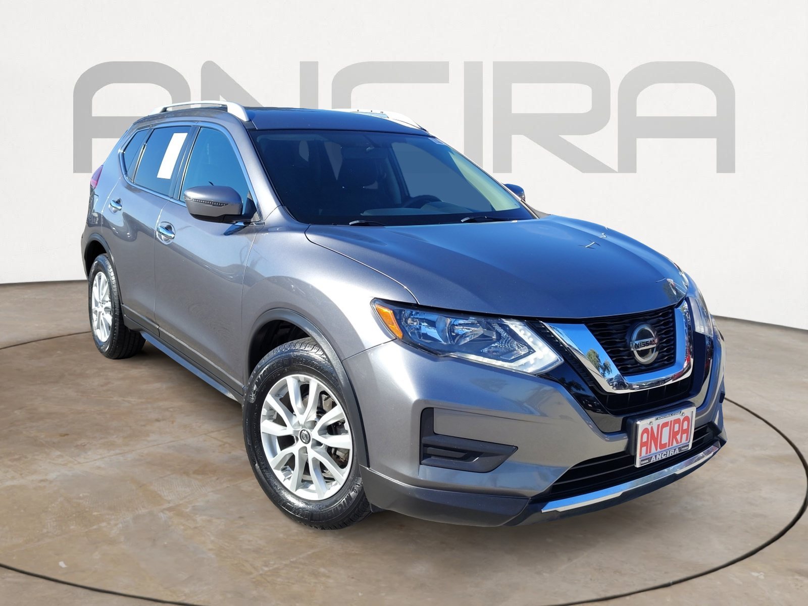 Used 2018 Gun Metallic Nissan SV image 4