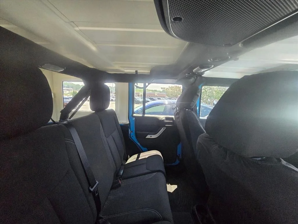 Used 2017 Blue Jeep Unlimited Sahara image 8