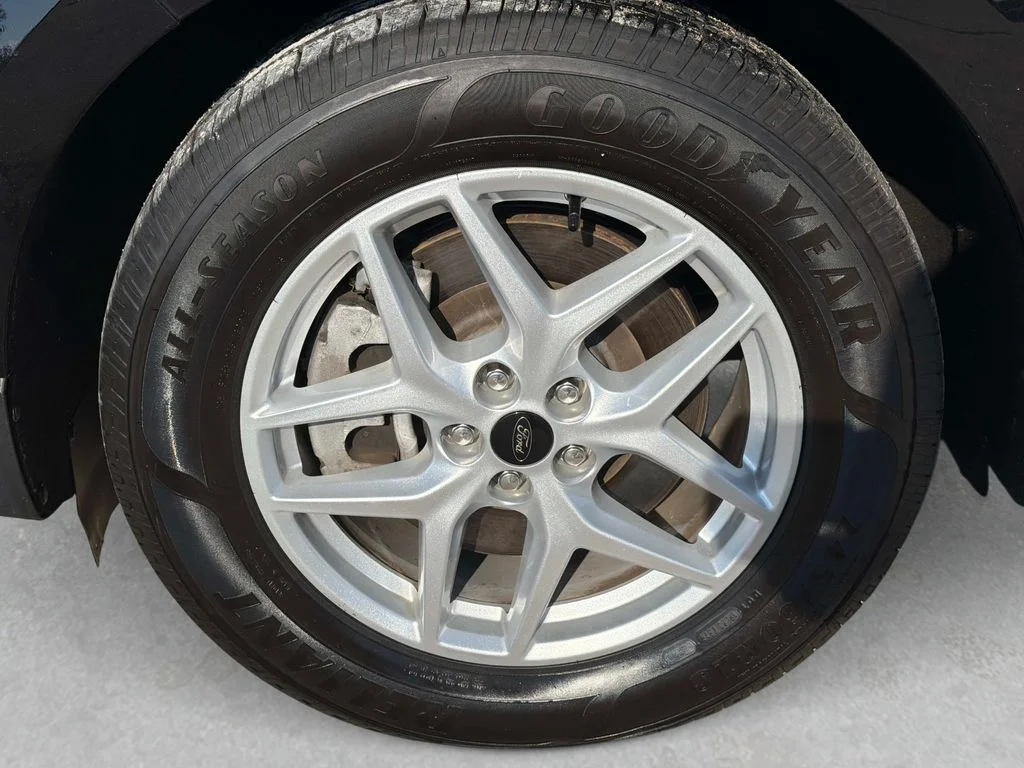 Used 2024 Agate Black Metallic Ford SEL image 12