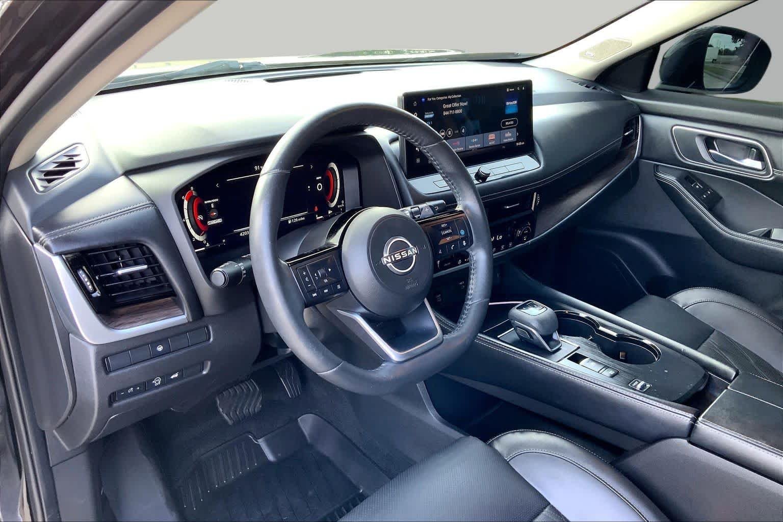 Used 2024 Super Black Nissan Platinum image 18