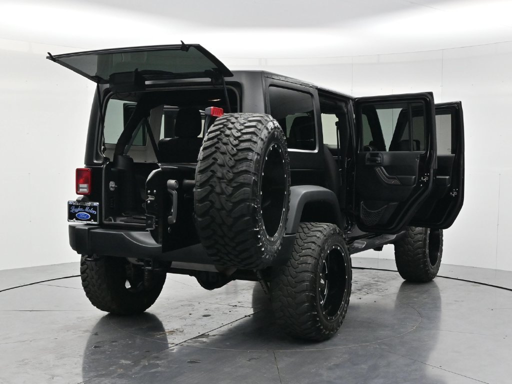 Used 2014 Black Clearcoat Jeep Unlimited Sport image 56