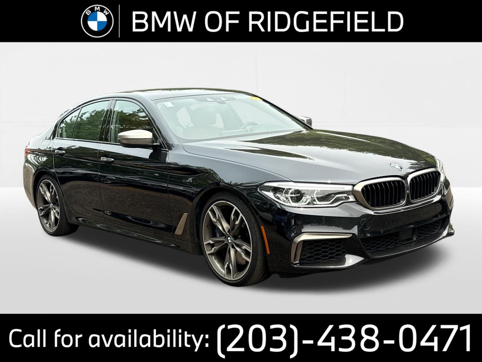 Used 2018 Black Sapphire Metallic BMW M550i xDrive image 1