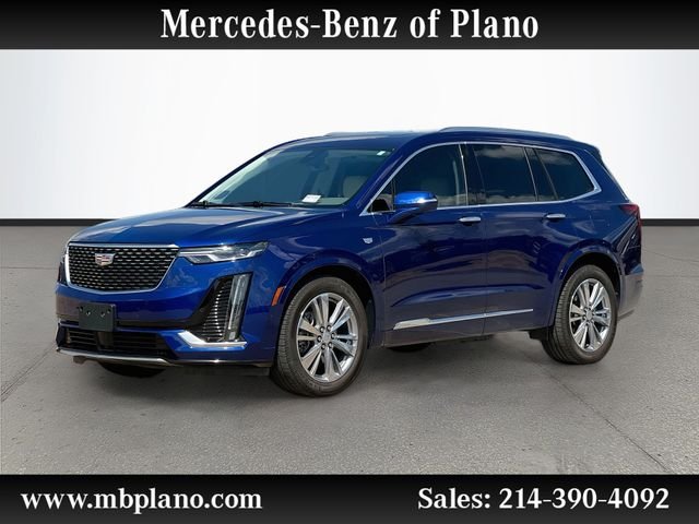 Used 2024 Blue Cadillac Premium Luxury image 1