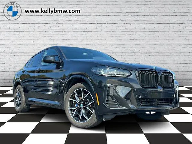 Used 2022 Black Sapphire Metallic BMW M40i image 1