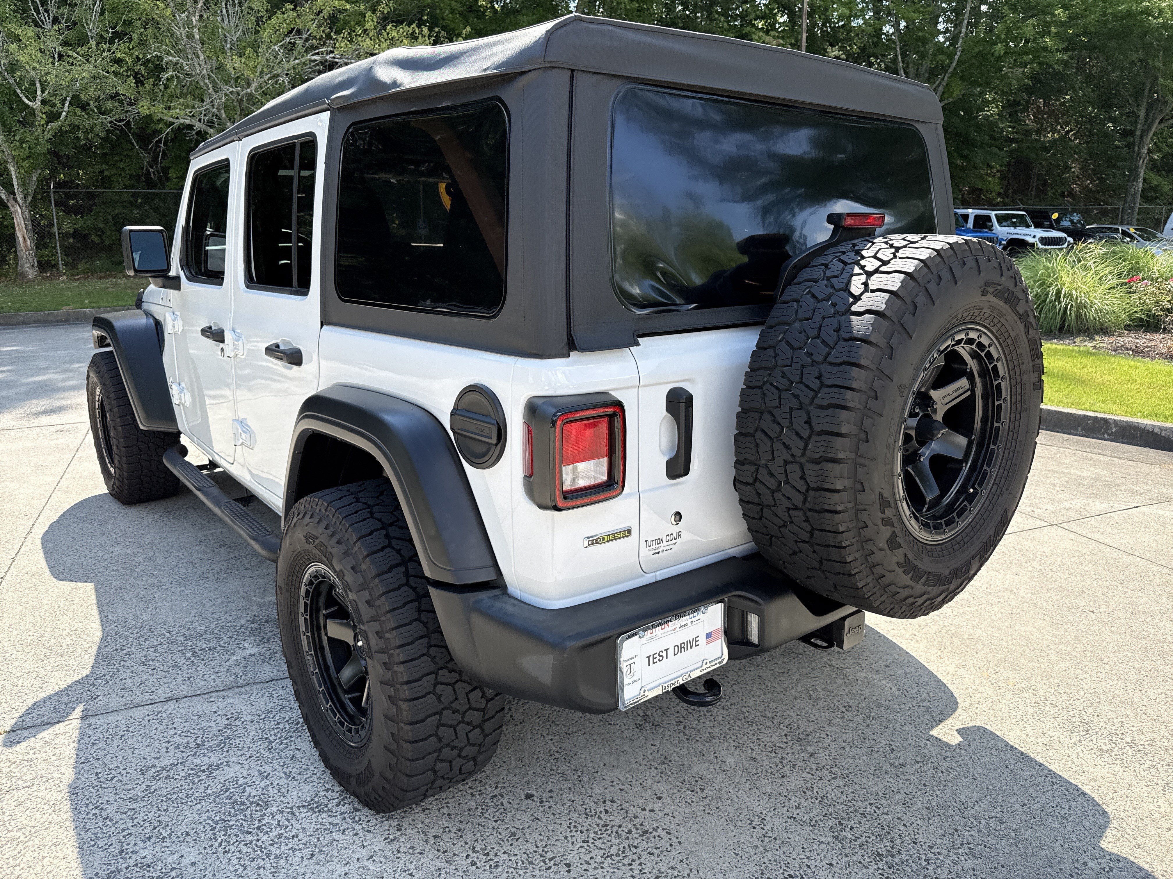 Used 2021 Bright White Clearcoat Jeep Unlimited Sport image 5