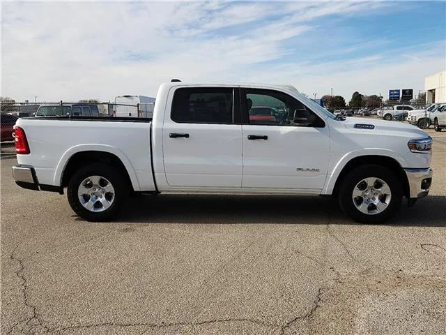 Used 2025 Bright White Clearcoat RAM Big Horn/Lone Star 4x4 Crew Cab 144.5 in. WB image 5