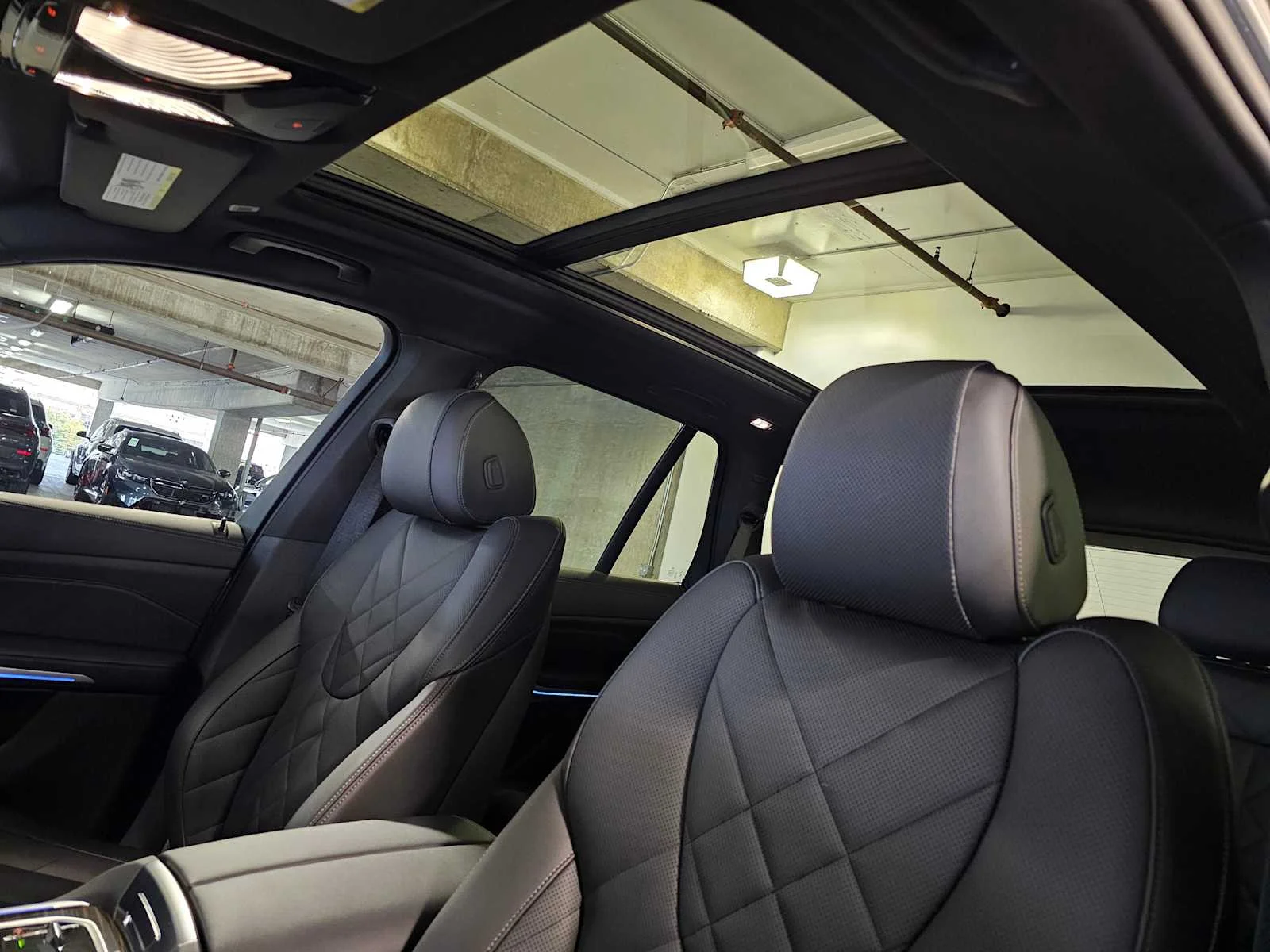 Certified Used 2026 Skyscraper Grey Metallic BMW xDrive50e image 24