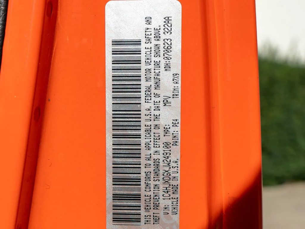 Used 2018 Orange Jeep Unlimited Sport S image 36