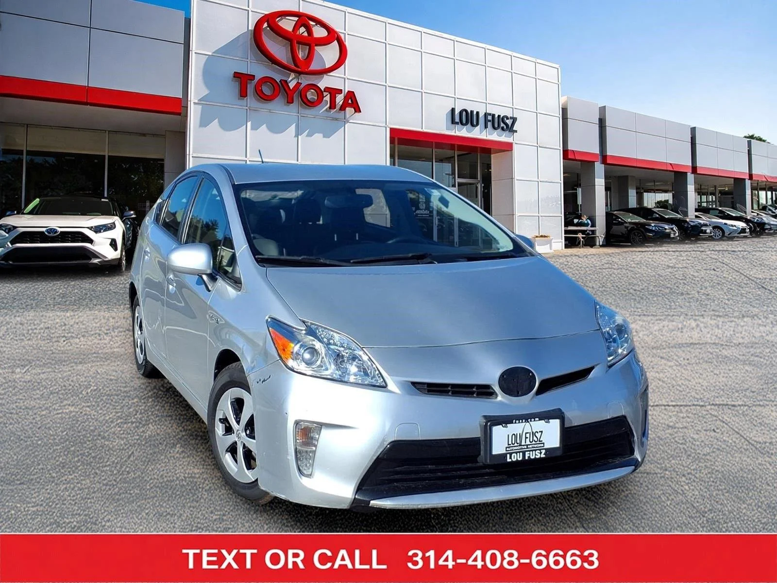 Used 2015 Classic Silver Metallic Toyota Four image 1