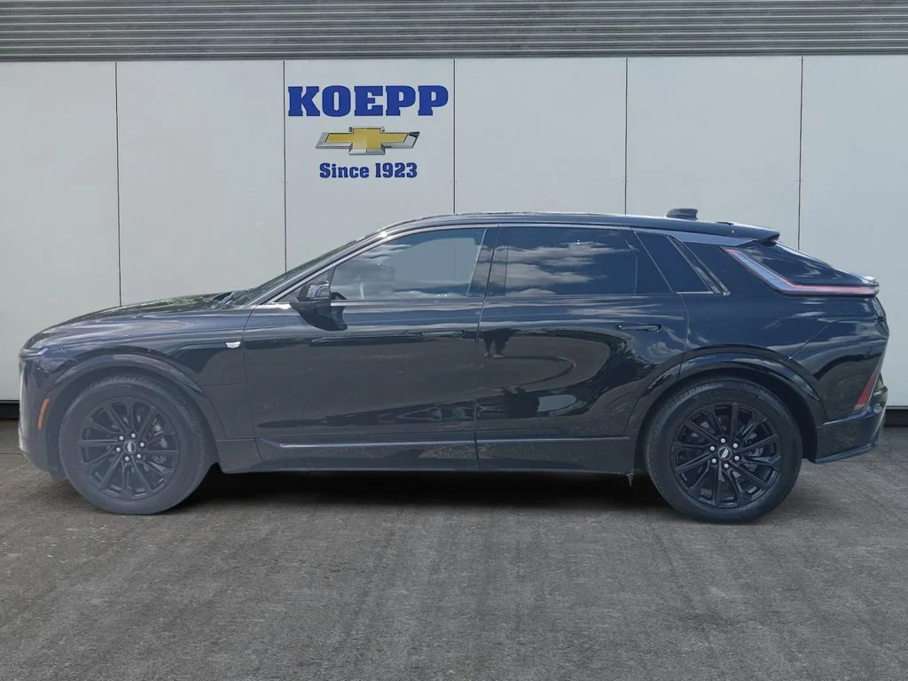 Used 2024 Stellar Black Metallic Cadillac Sport 1 image 2