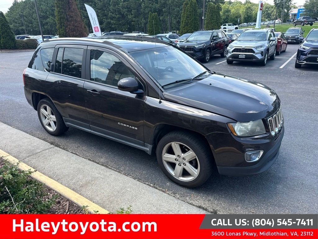 Used 2014 Brown Jeep Latitude image 1