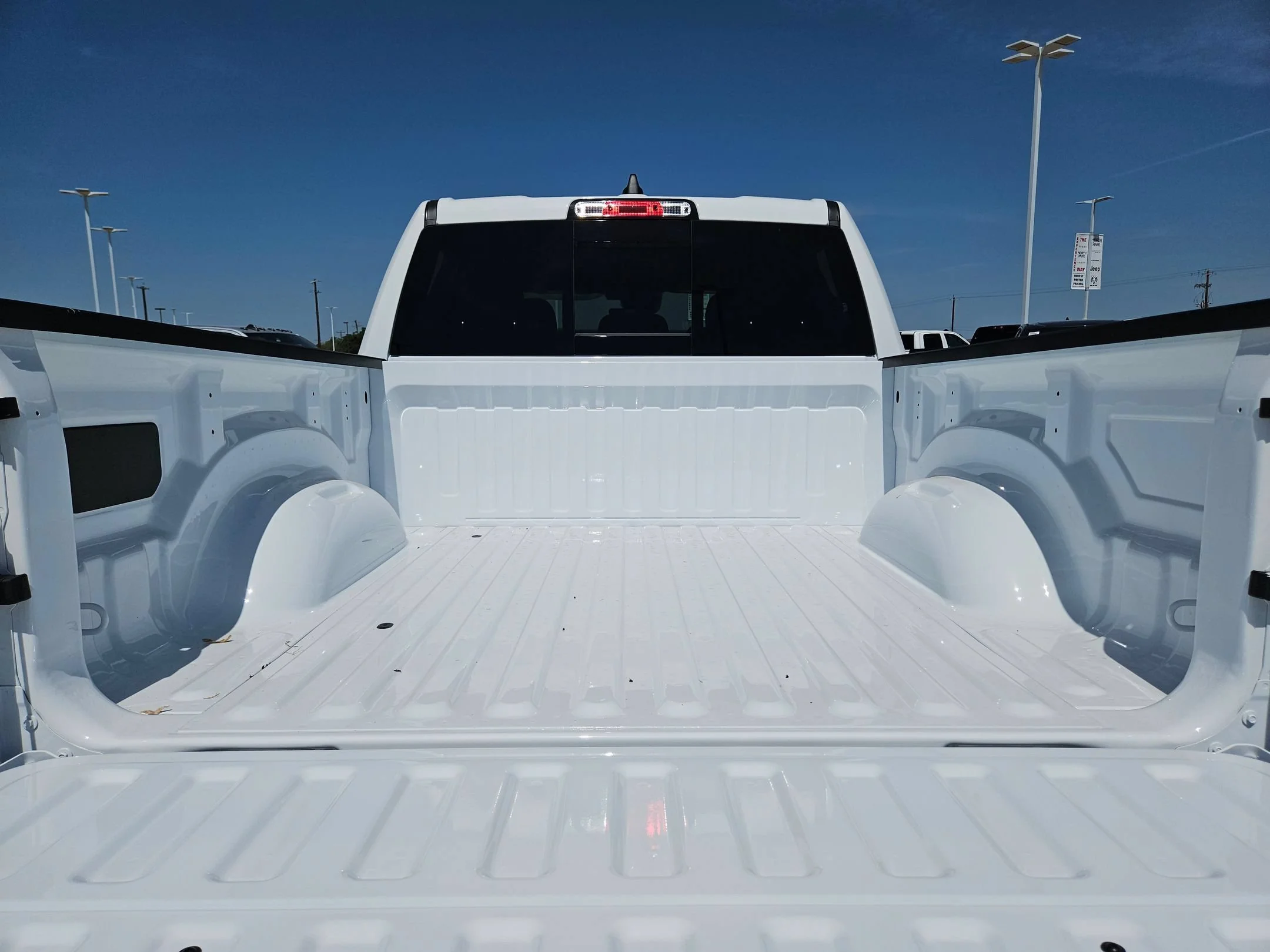 New 2026 Bright White Clearcoat RAM Black Express image 19