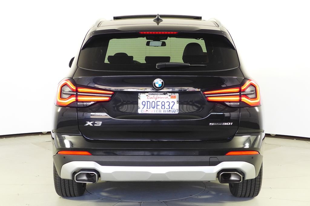 Used 2023 Black Sapphire Metallic BMW sDrive30i image 8