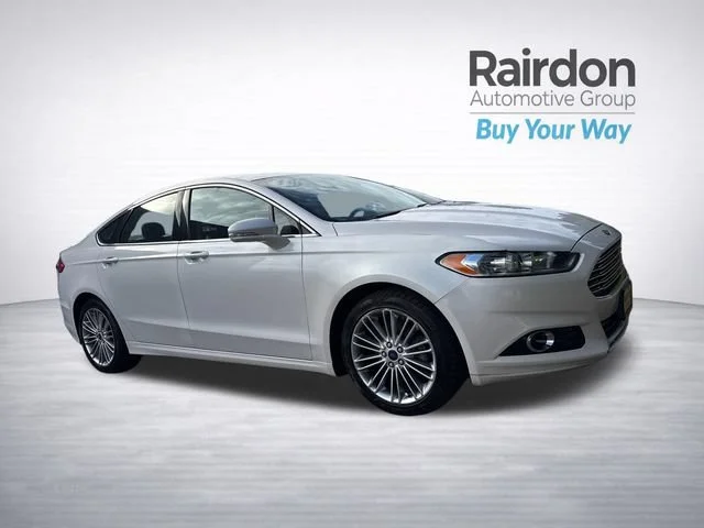 Used 2013 White Platinum Clearcoat Metallic Ford SE Hybrid image 1
