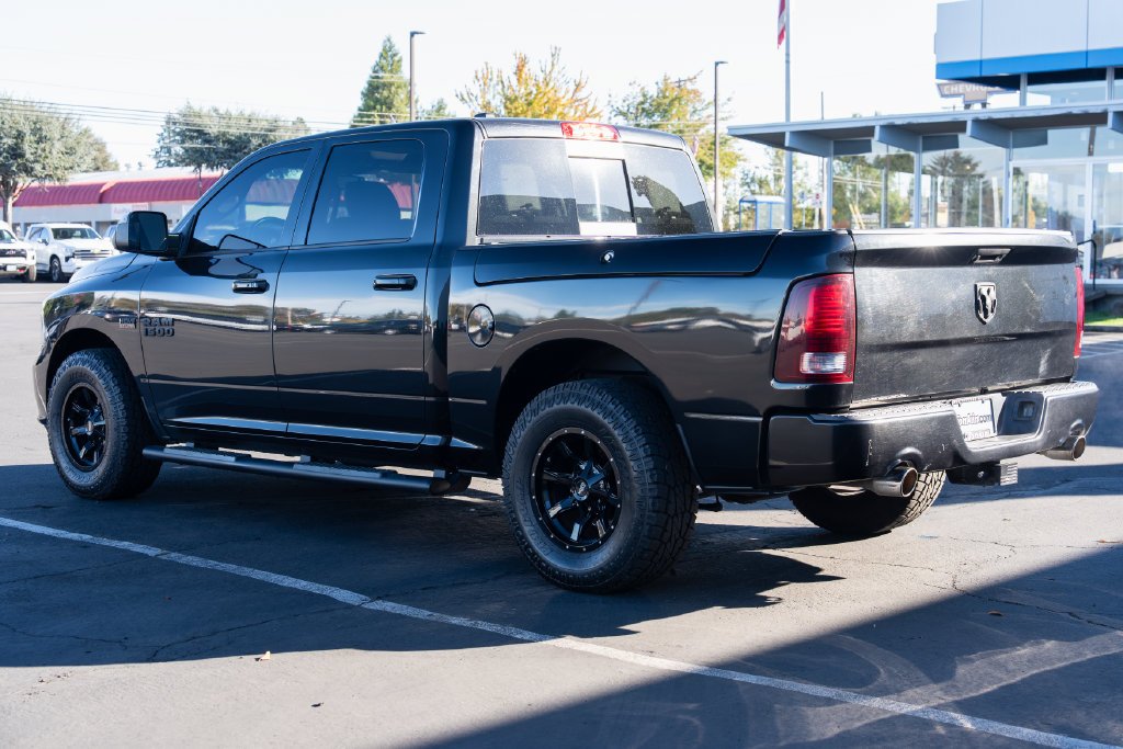 Used 2016 Brilliant Black Crystal Pearlcoat Ram Sport image 3