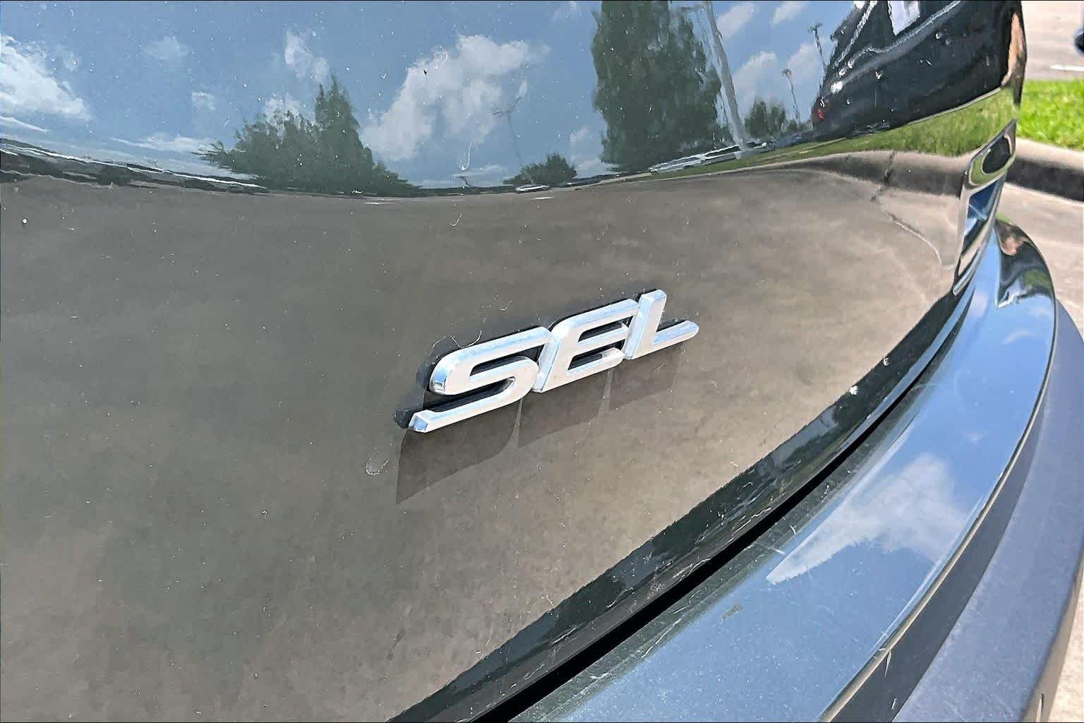 Used 2024 Forged Green Metallic Ford SEL image 9