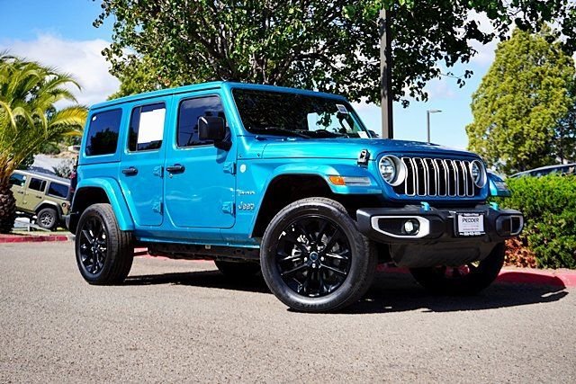 Used 2024 Blue Jeep Sahara 4xe image 1