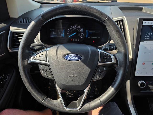 Used 2024 Agate Black Metallic Ford SEL image 22