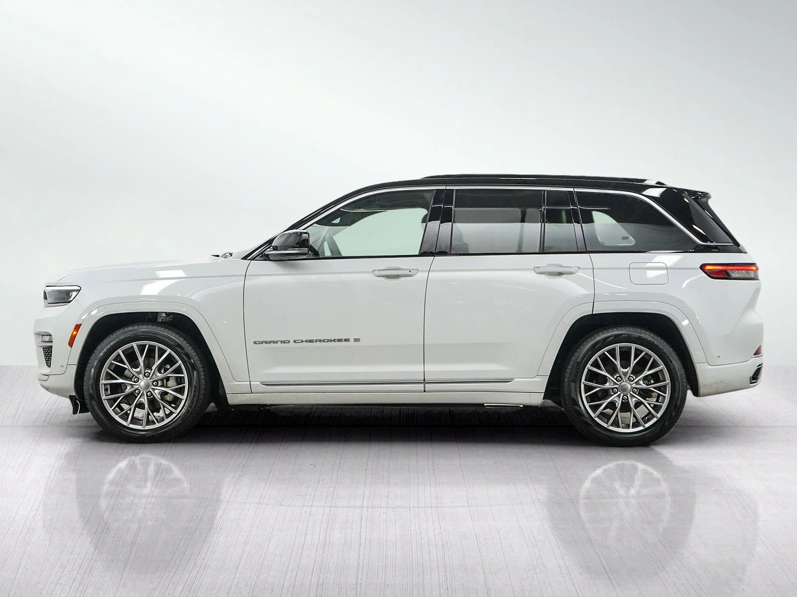 Used 2025 Jeep Grand Cherokee Summit with VIN 1C4RJHEG9S8747089 for sale in Hopkins, Minnesota