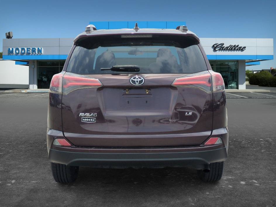 Used 2016 Black Currant Metallic Toyota LE image 4