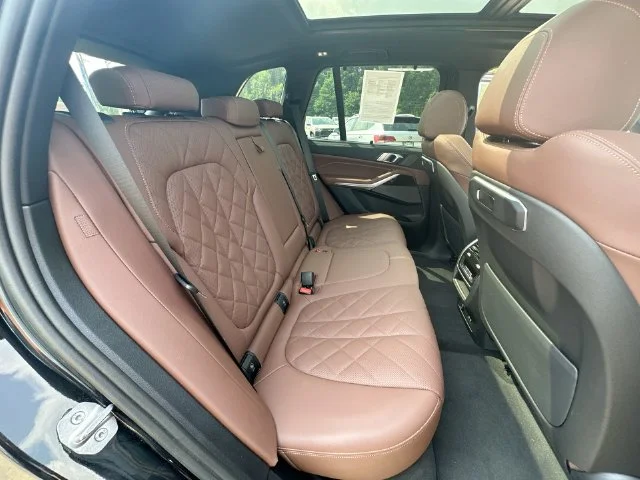 Used 2024 Black BMW xDrive50e image 31