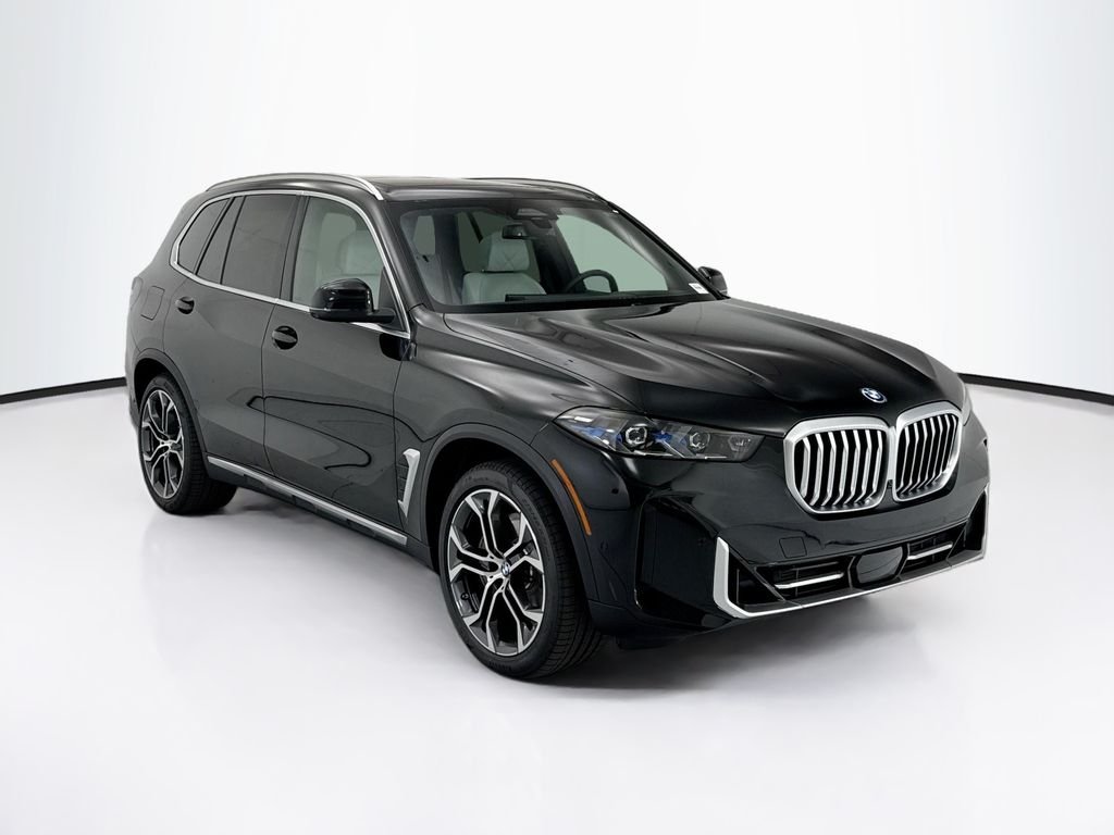 New 2026 Black Sapphire Metallic BMW xDrive50e image 3