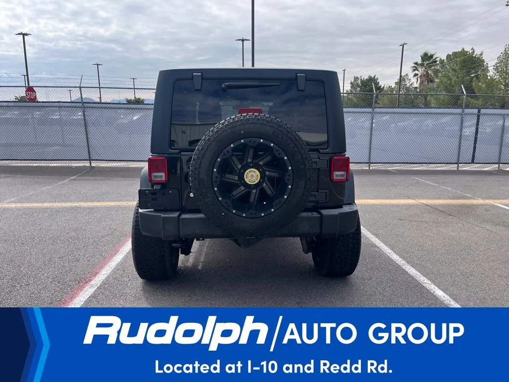 Used 2018 Black Clearcoat Jeep Unlimited Sport image 4