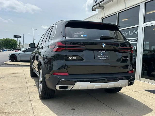 Certified Used 2024 Black Sapphire Metallic BMW xDrive40i image 7