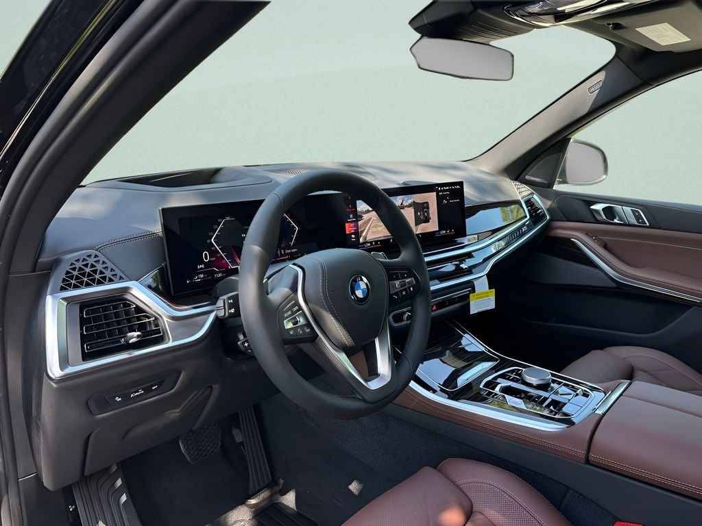 New 2026 Black Sapphire Metallic BMW xDrive50e image 8
