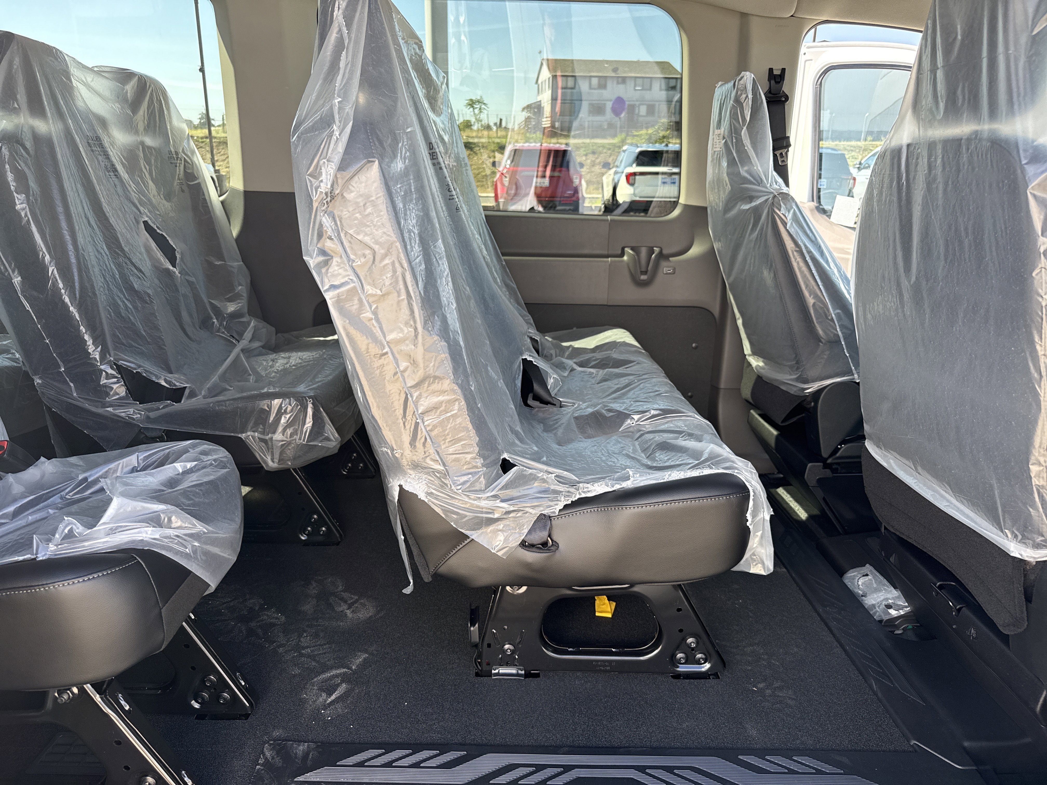 New 2026 Oxford White Ford Passenger Van XL image 13