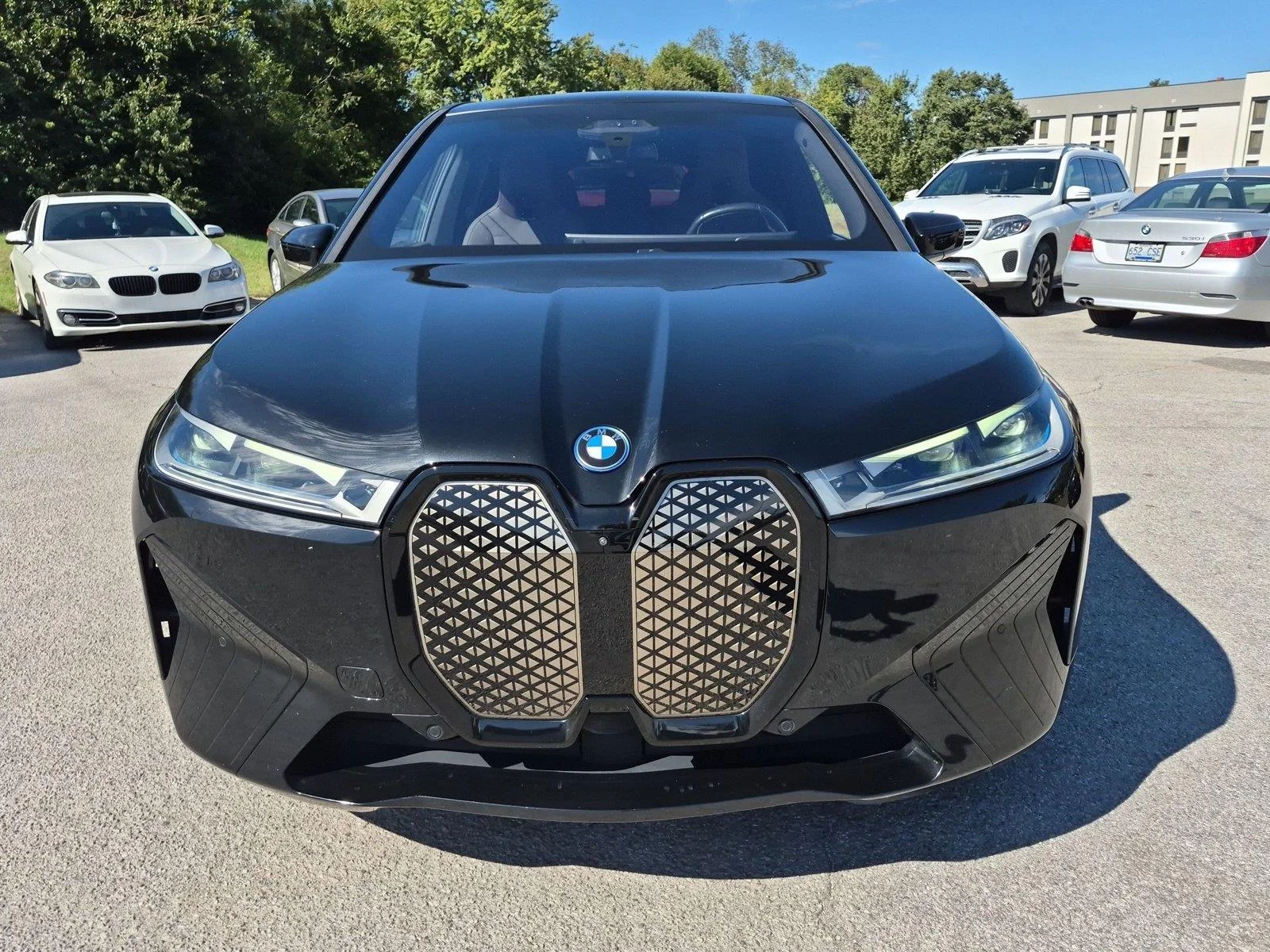 Used 2024 Black Sapphire Metallic BMW xDrive50 image 8