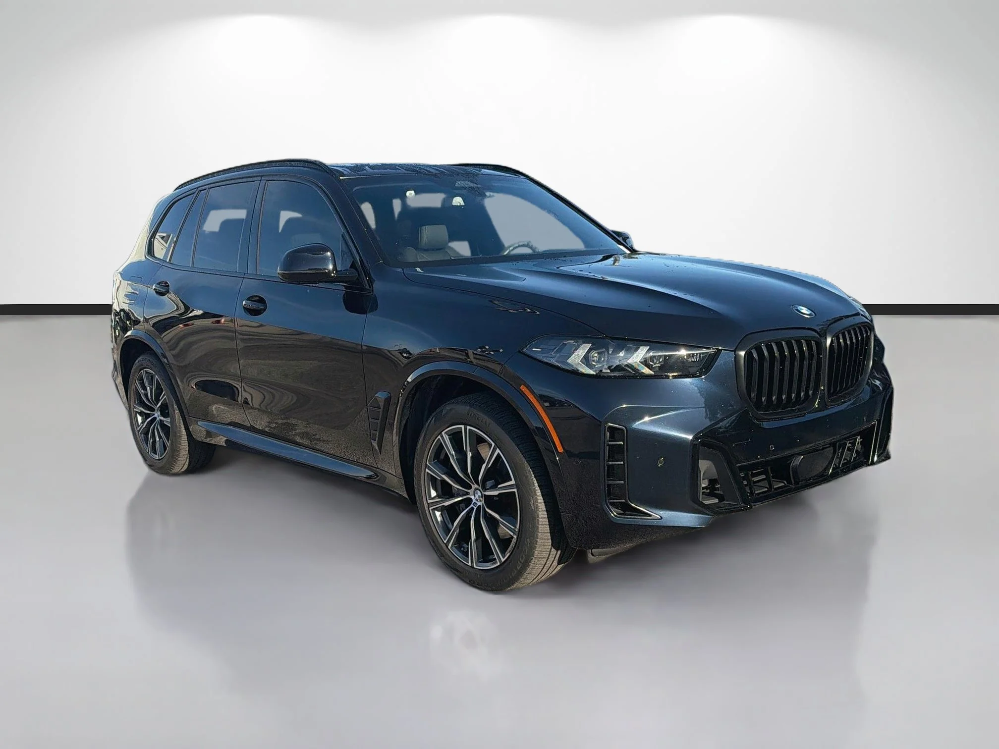 Used 2024 Carbon Black Metallic BMW xDrive40i image 1