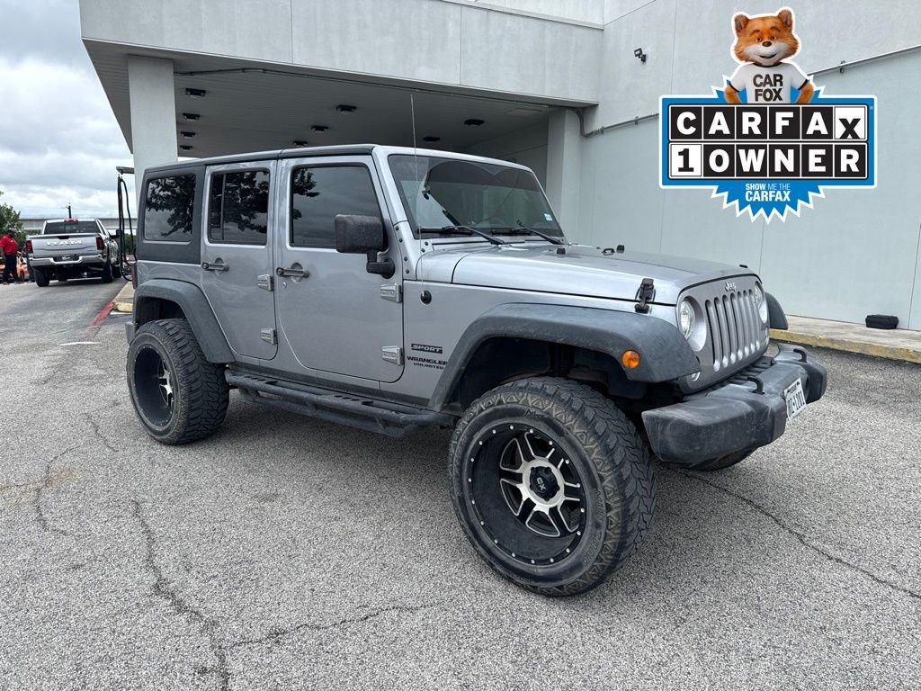 Used 2017 Silver Jeep Unlimited Sport image 1