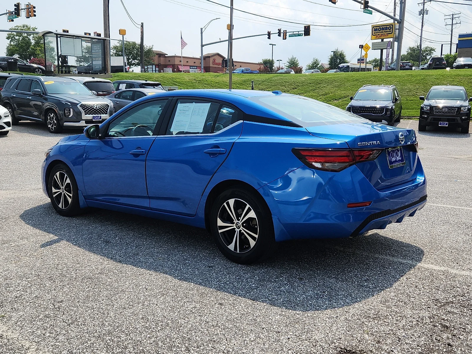 Used 2023 Electric Blue Metallic Nissan SV image 4