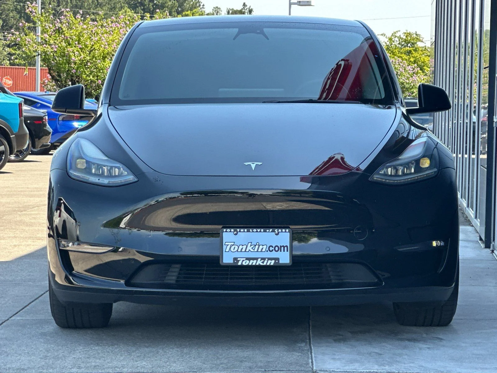 Used 2022 Solid Black Tesla Performance image 8