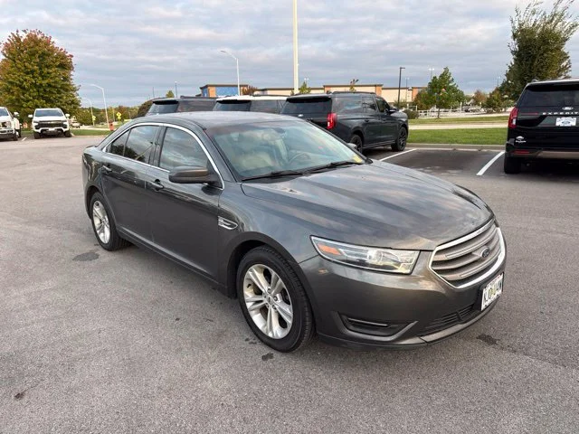 Used 2018 Magnetic Metallic Ford SEL image 1