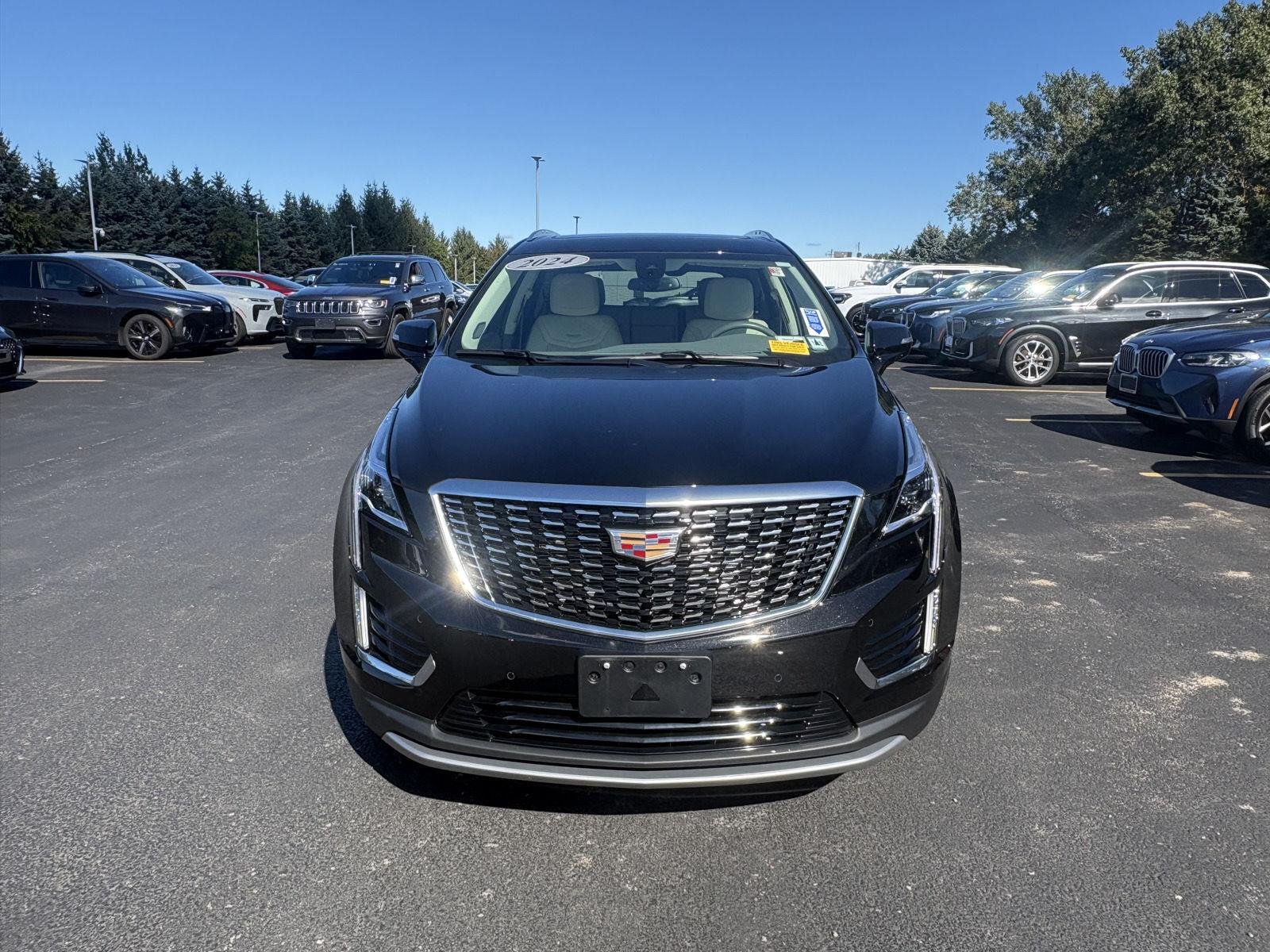 Used 2024 Stellar Black Metallic Cadillac AWD Premium Luxury image 2